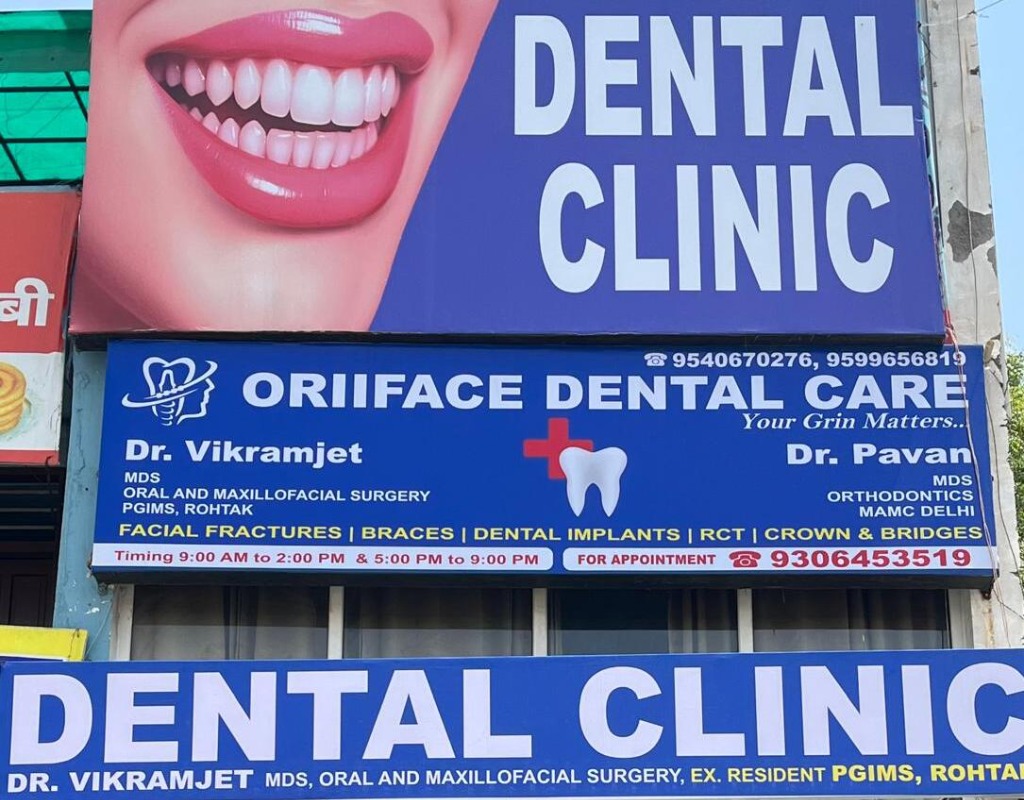 Oriiface Dental Care clinic signboard at Delhi Bypass Chowk, Rohtak